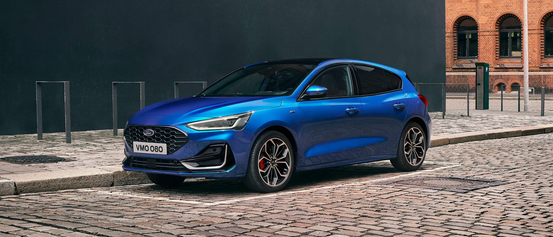 Blue Focus parked on the street