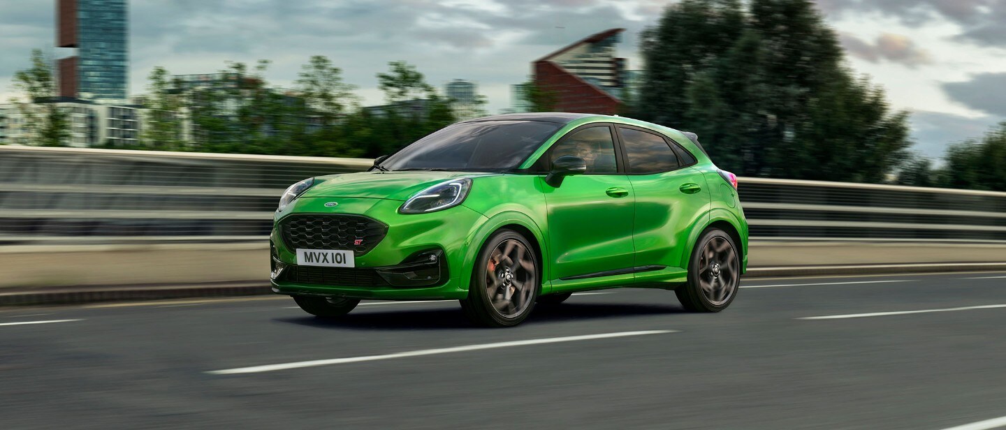Green Puma ST in motion