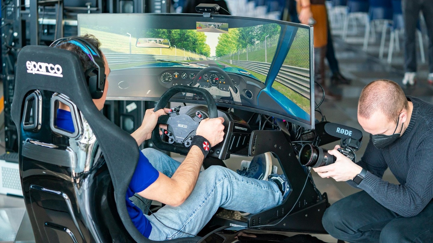 Man playing a driving videogame
