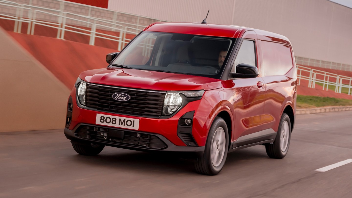 Ford New Transit Courier driving thru city