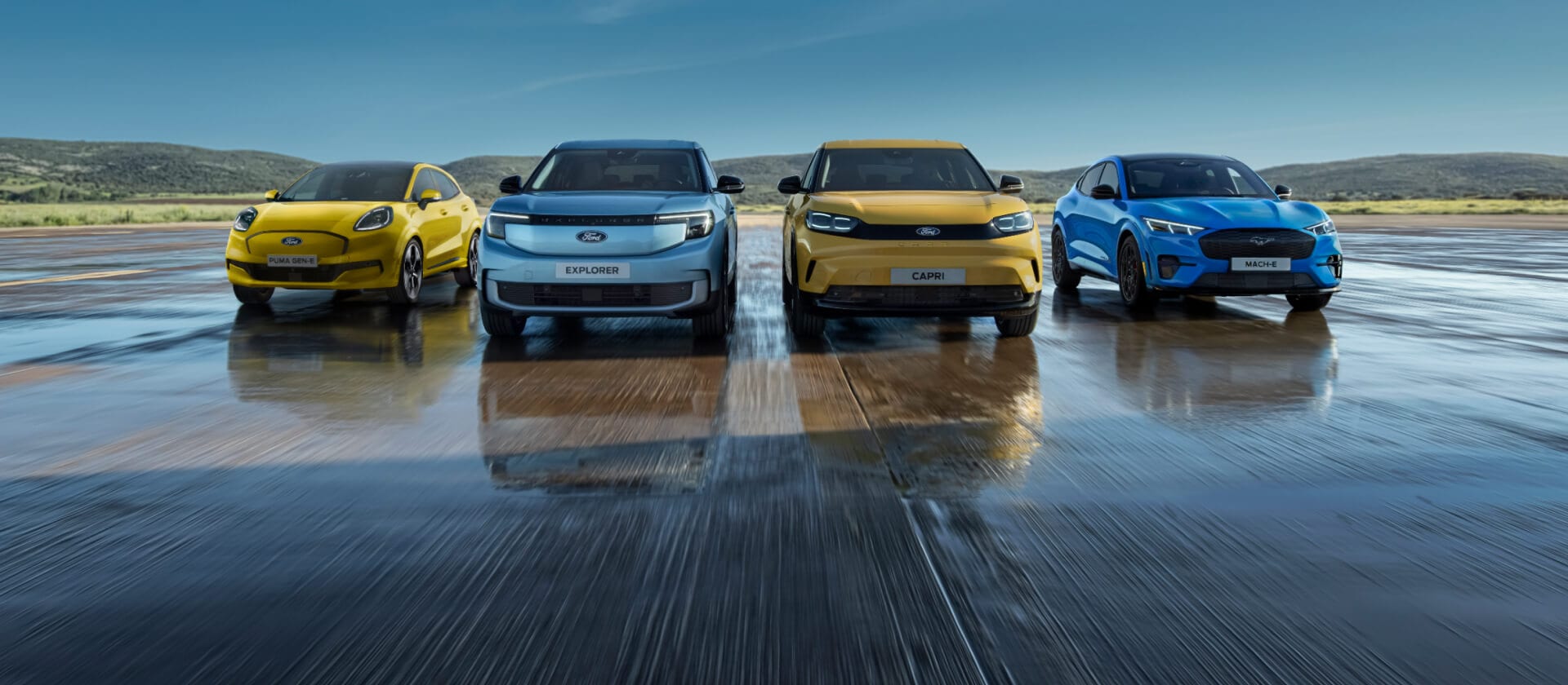 Gamma di veicoli elettrici Ford, tra cui Ford Puma Gen-E, Ford Explorer, Ford Capri e Ford Mustang Mach-E.