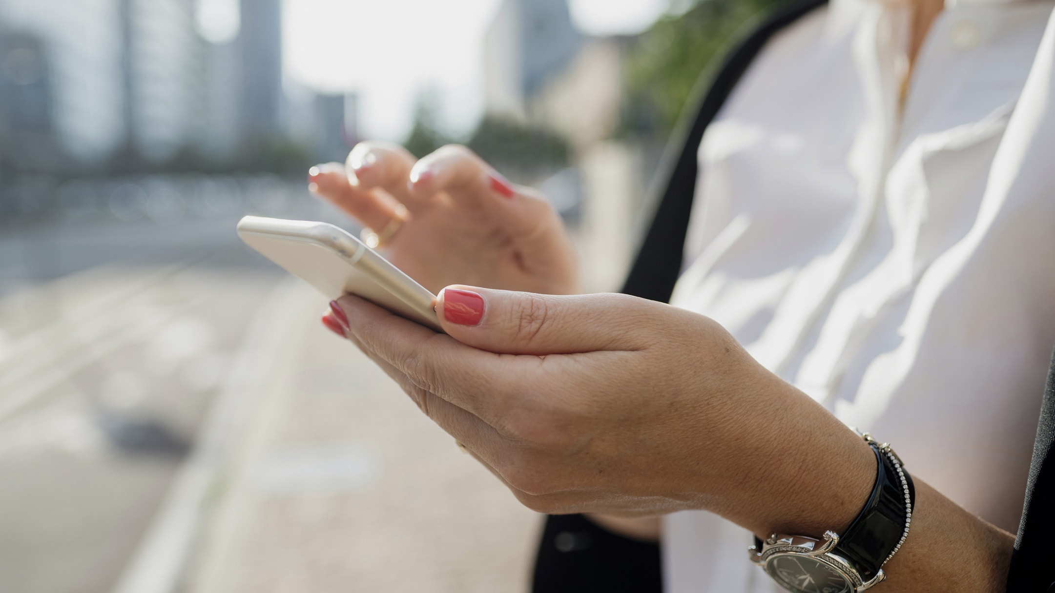 Woman interacting with a smartphone