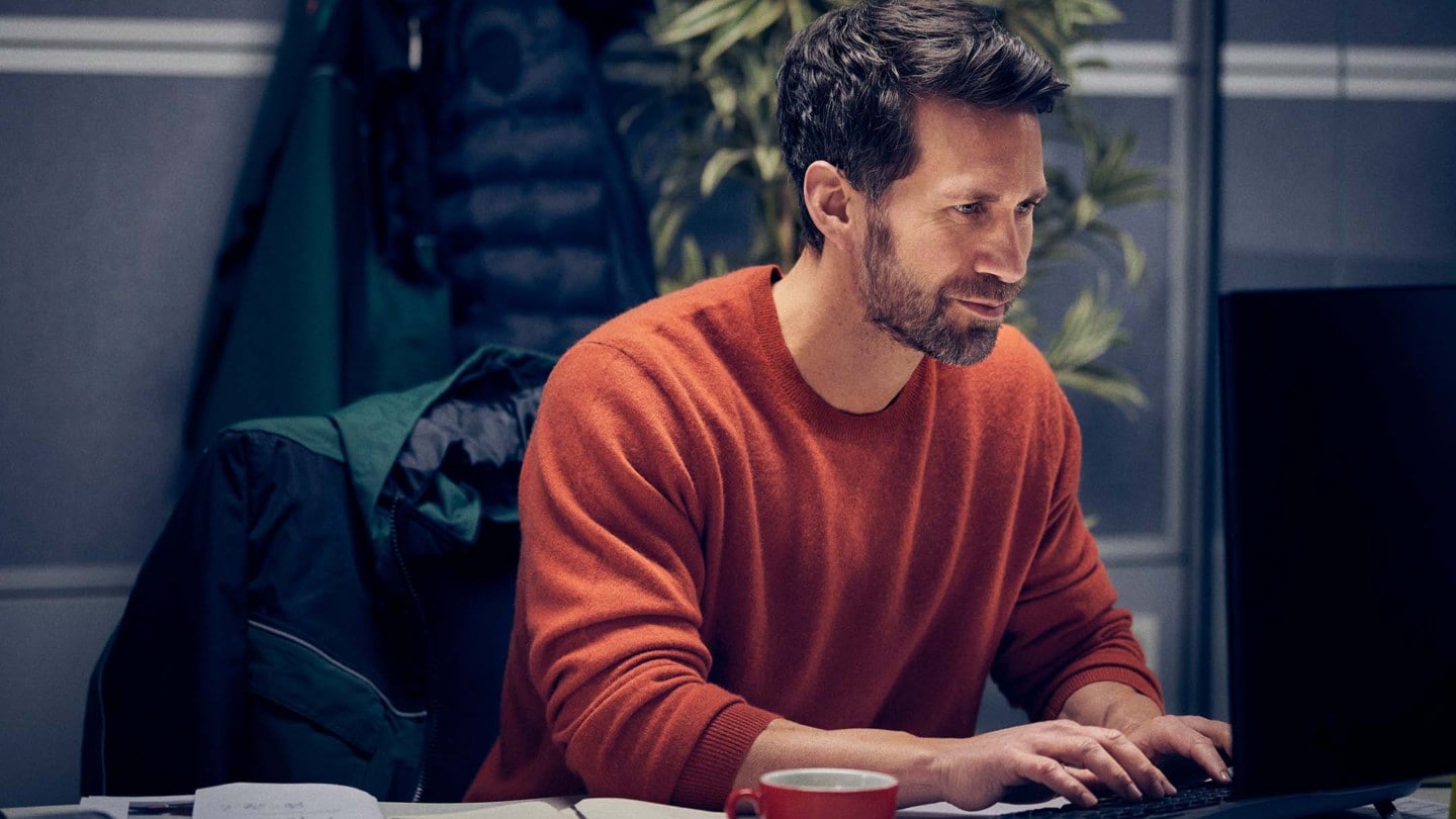 Man typing on a computer