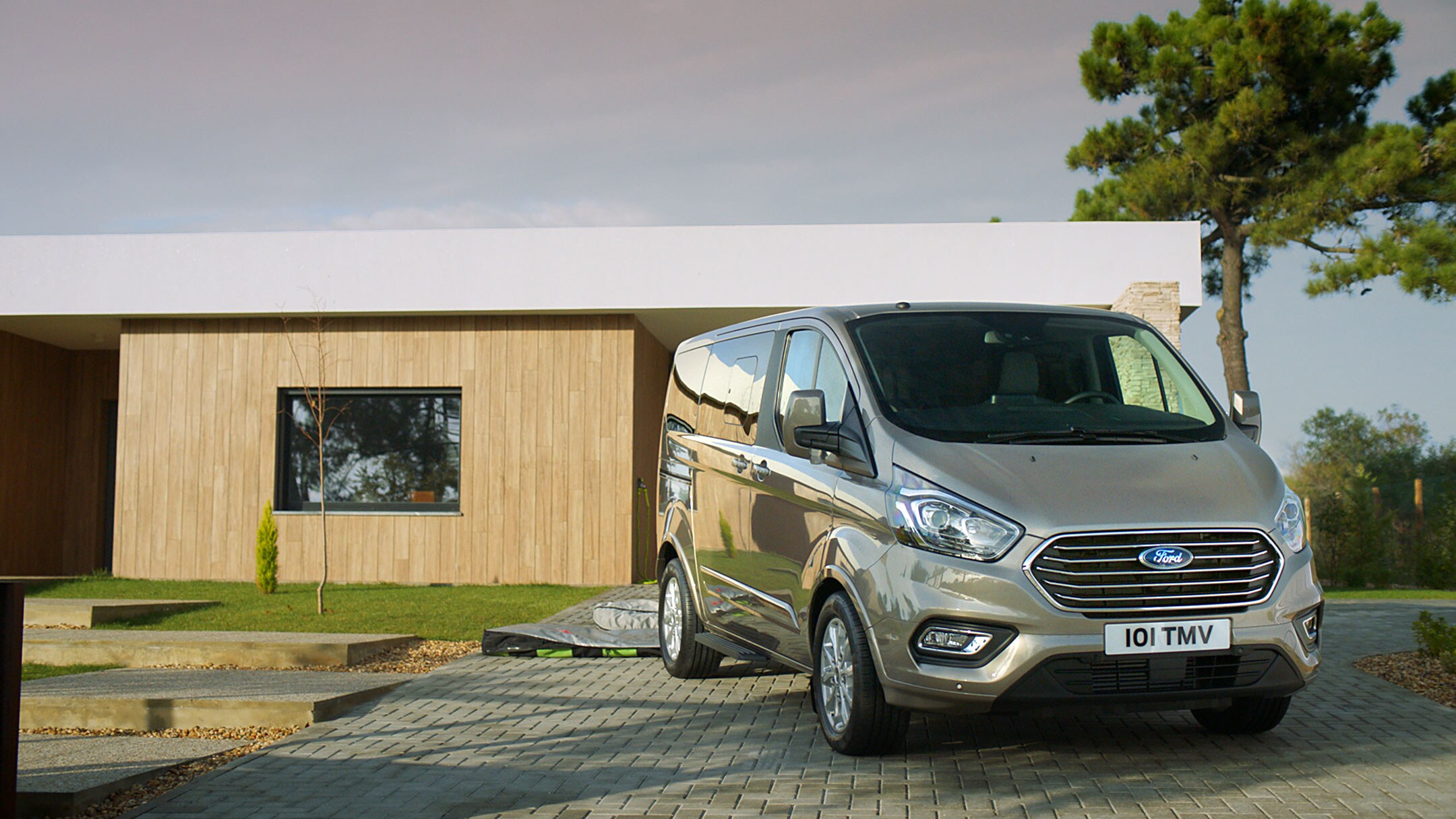 Ford Tourneo in front of house