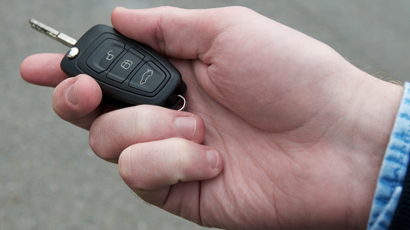 Hand with key