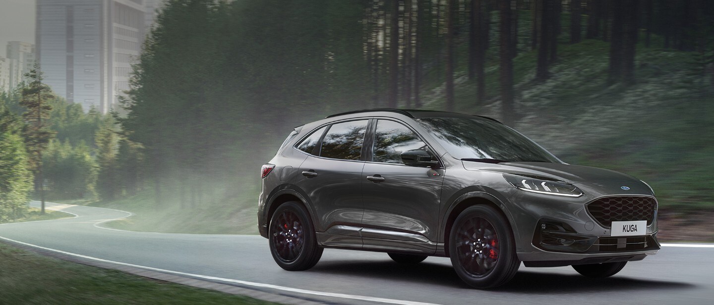 Black Ford Kuga driving