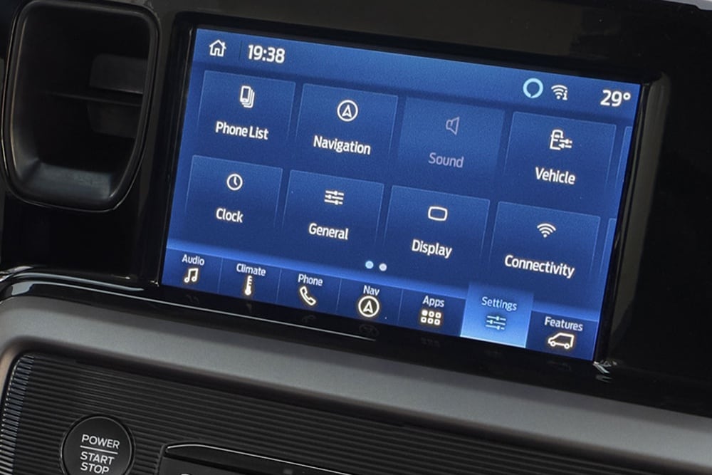 The Ford Tourneo Courier infotainment screen displays menu options including Phone List, Navigation, Sound, Vehicle, and Connectivity.