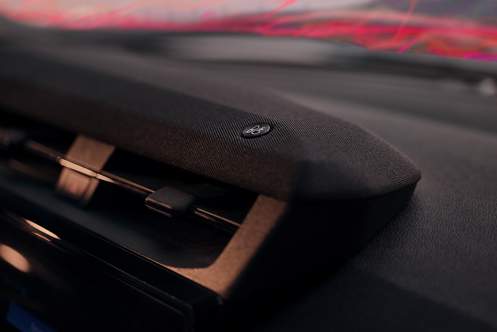 A close up of the B&O premium sound system speaker and logo inside the Ford Puma Gen-E Sound Edition.