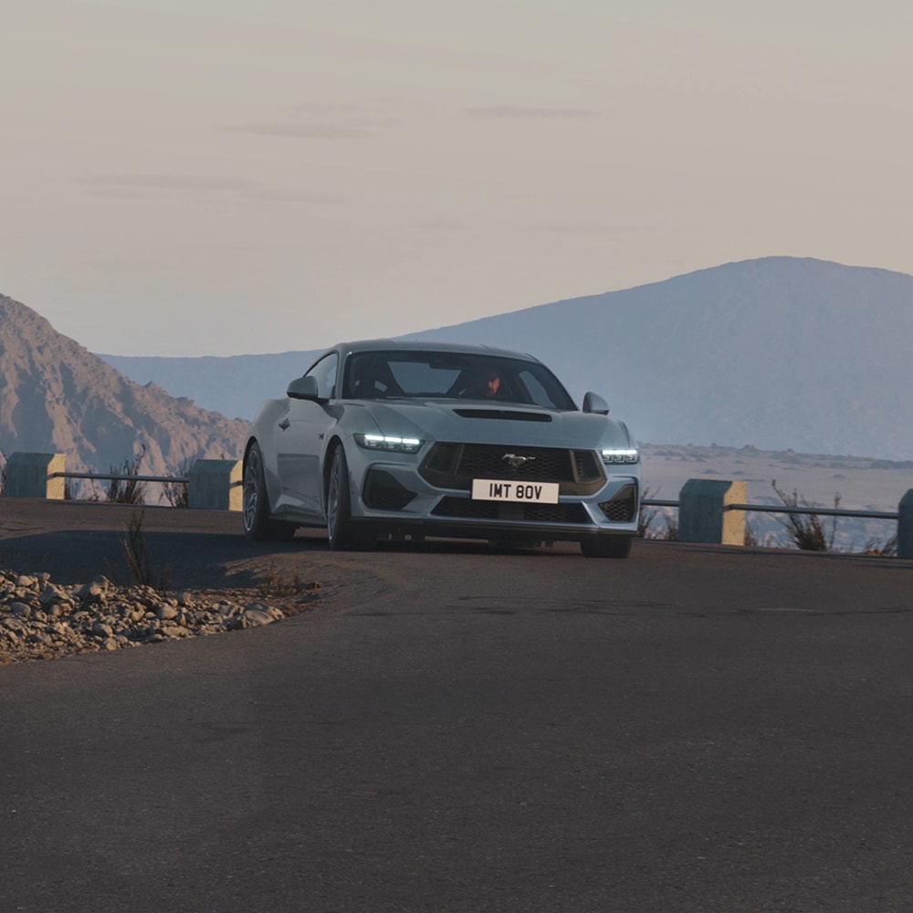 All-New Ford Mustang driving round a corner