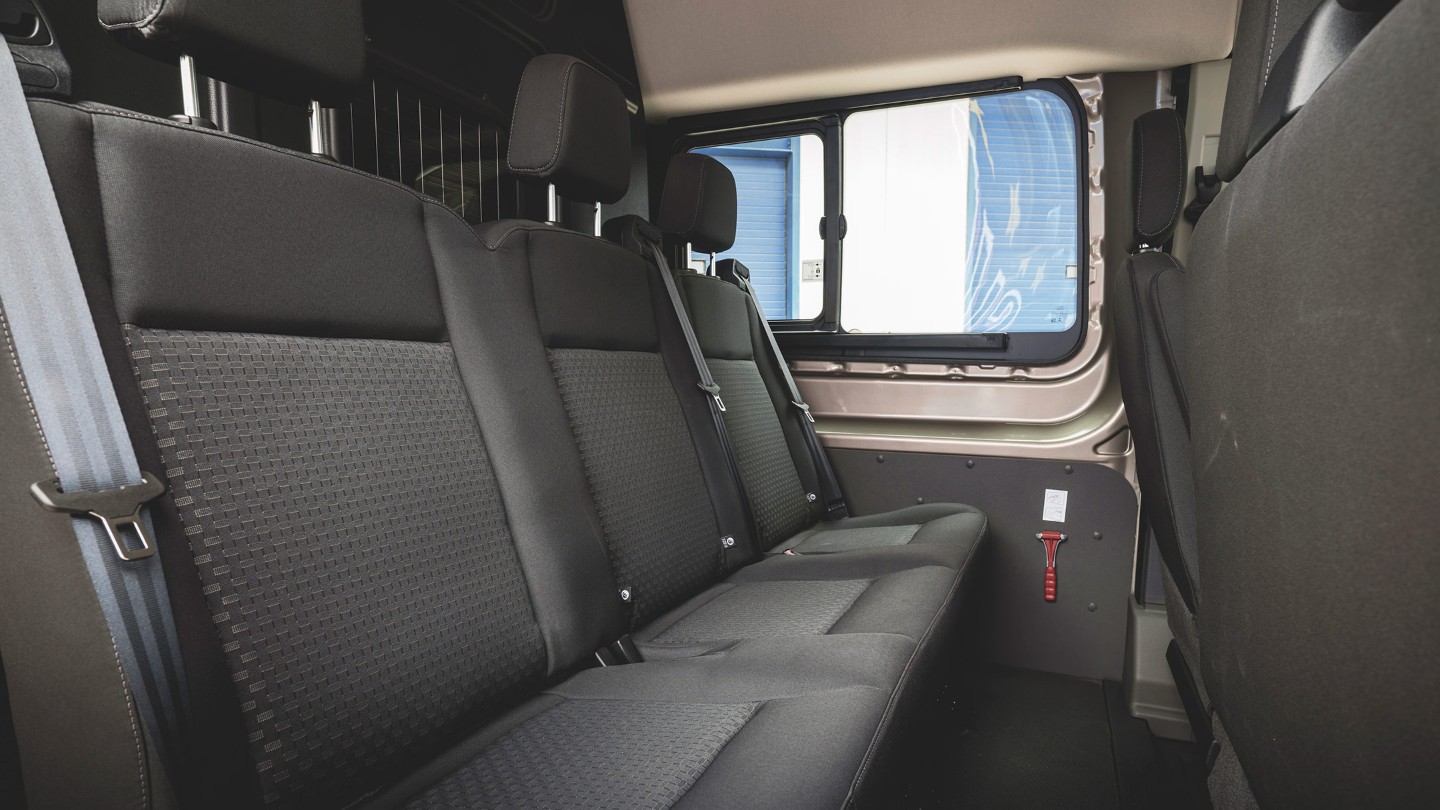 Ford E-Transit Double Cab in Van back seat view