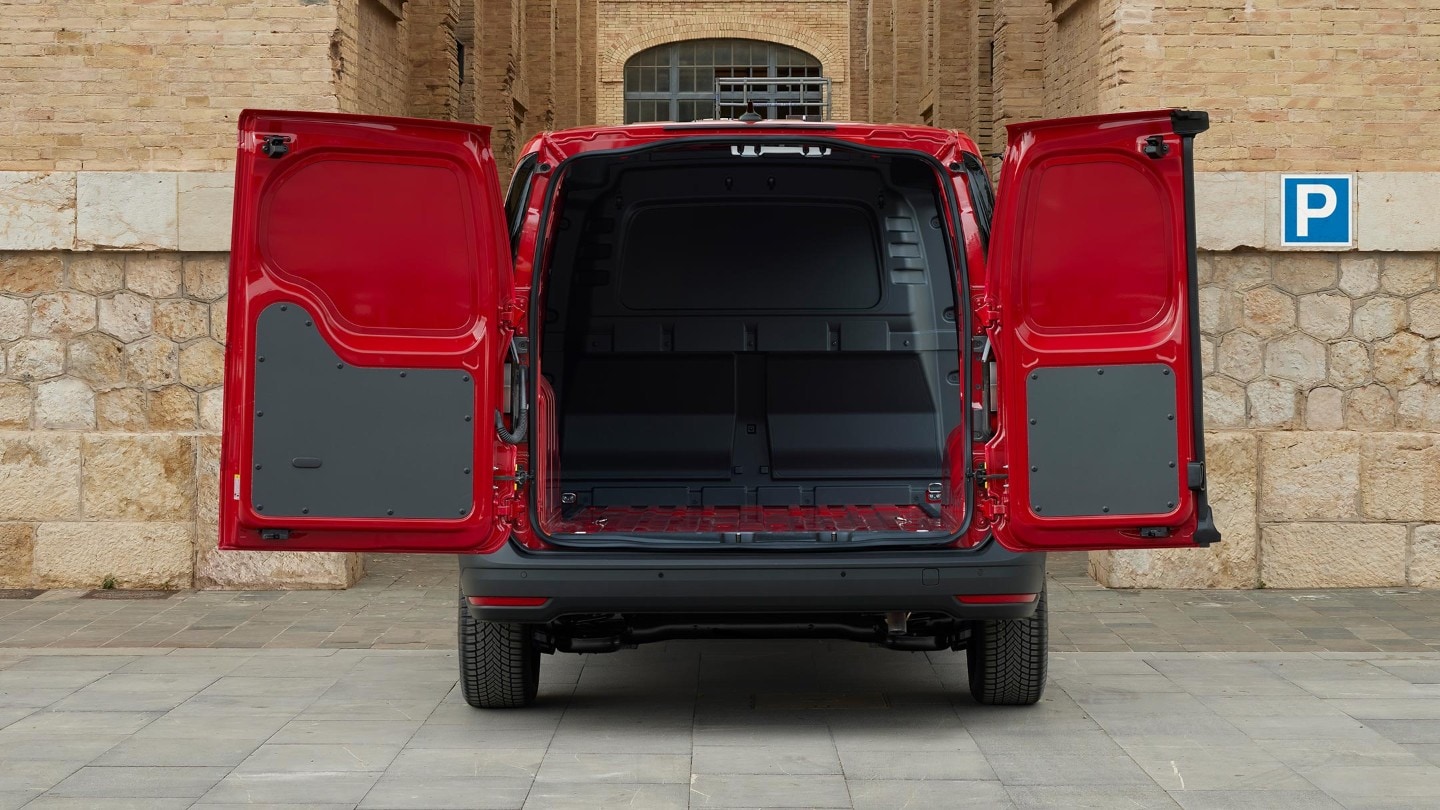 Le portiere aperte mostrano la paratia del nuovo Ford Transit Connect in Maple Red