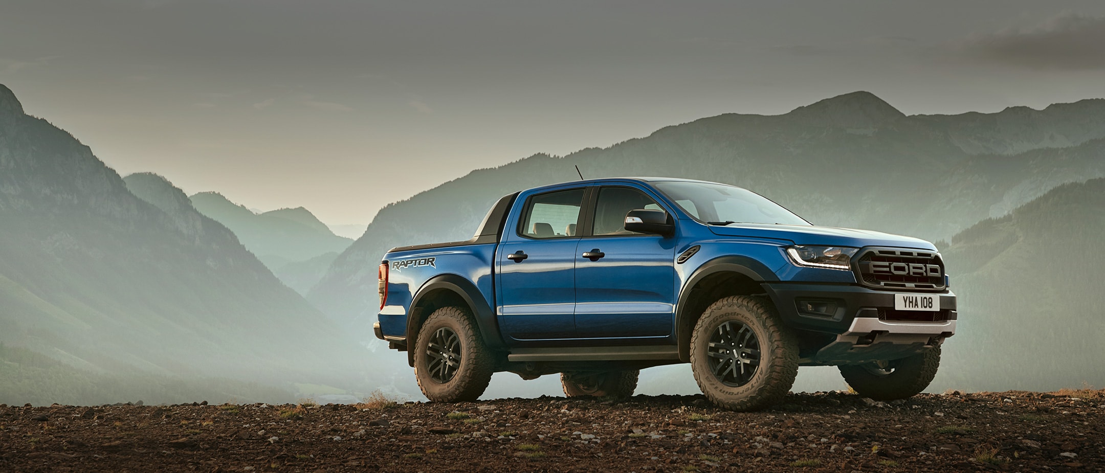 Ford Ranger Raptor parked in the middle of mountains