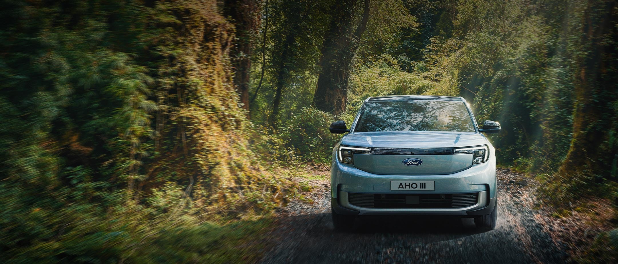 The New All-Electric Explorer being driven through wild landscape