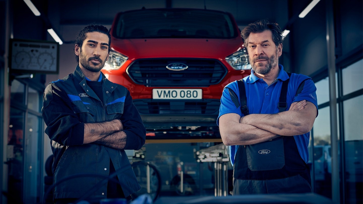 Ford Transit Custom being inspected by maintenance crew